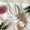 CREAM BOW RABBIT RATTLE